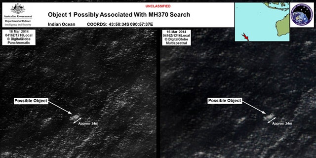 In this March 16, 2014 satellite imagery provided by Commonwealth of Australia - Department of Defence on Thursday, March 20, 2014, a floating object is seen at sea next to the descriptor which was added by the source. Australia's government reported Thursday, March 20, 2014 that the images show suspected debris from the missing Malaysia Airlines jetliner floating in an area 2,500 kilometers (1,550 miles) southwest of Perth Australia. (AP Photo/Commonwealth of Australia - Department of Defence)