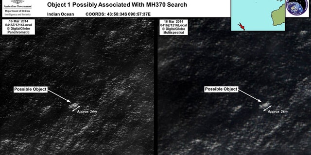 In this March 16, 2014 satellite imagery provided by Commonwealth of Australia - Department of Defence on Thursday, March 20, 2014, a floating object is seen at sea next to the descriptor which was added by the source. Australia's government reported Thursday, March 20, 2014 that the images show suspected debris from the missing Malaysia Airlines jetliner floating in an area 2,500 kilometers (1,550 miles) southwest of Perth Australia. (AP Photo/Commonwealth of Australia - Department of Defence)
