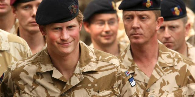 May 5, 2008: Britain's Prince Harry, left, arriving for a Thanksgiving service at the Army Garrison Church in Windsor, England, after receiving a campaign medal for serving in Afghanistan.