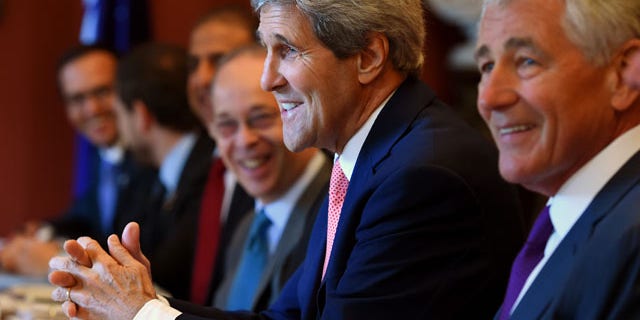 August 12, 2014: U.S. Secretary of State John Kerry, second from right, along with U.S. Secretary of Defense Chuck Hagel, right, addresses the start of the Australia-US Ministerial Consultations (AUSMIN) talks at Admiralty House in Sydney. (AP Photo/Dan Himbrechts, Pool)