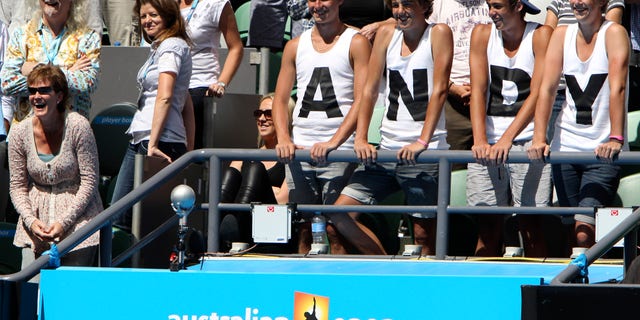 Jan. 24: Scottish comedian Billy Connolly, top left, and Judy Murray, bottom left, stand with supporters of Britain's Andy Murray as he is interviewed after beating Austria's Jurgen Melzer in the fourth round match at the Australian Open tennis championships in Melbourne, Australia.
