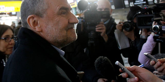 Jan. 28, 2012: Herman Nackaerts of the International Atomic Energy Agency, IAEA, the chief agency official in charge of the Iran file, prepares for his flight to Iran at Vienna's Schwechat airport, Austria.