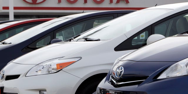 This Feb. 19, 2012 file photo shows a line of 2012 Prius sedans at a Toyota dealership in the south Denver suburb of Littleton, Colo. Toyota and Chrysler saw big U.S. sales gains in April 2012, but they came at the expense of General Motors and Ford. Toyota said its sales rose 12 percent as its inventories finally return to pre-earthquake levels. (AP Photo/David Zalubowski)