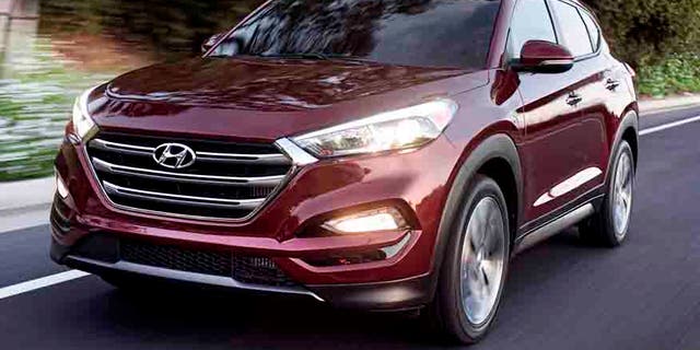 FILE - This photo provided by Hyundai Motor America shows the 2016 Hyundai Tucson.  Small SUVs did poorly in new headlight tests performed by the insurance industry. The Insurance Institute for Highway Safety says none of the 21 small SUVs tested earned its highest ranking. The Ford Escape, Honda CR-V, Hyundai Tucson and Mazda CX-3 performed best, but more than half the SUVs tested received the lowest ranking, including the Subaru Forester and the Audi Q3.(Morgan Segal/Hyundai Motor America via AP)