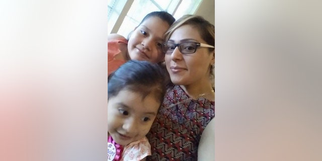 Diana Gomez with daughters Betsy and little Ava, in the front.