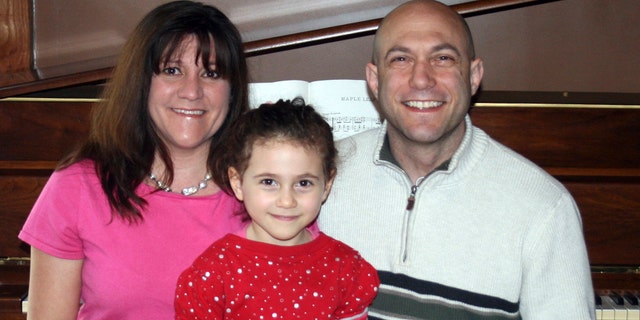 This undated photo provided by the Avielle Foundation shows Jeremy Richman, Jennifer Hensel and their daughter Avielle, 6, who was killed in the shooting massacre by Adam Lanza at Sandy Hook Elementary School in Newtown, Conn., on Dec. 14, 2012. As scientists, the couple wanted answers about what could lead a person to commit such violence. On Monday, April 15, 2013, they announced a scientific advisory board for the Avielle Foundation, which was established with the goal of reducing violence. (AP Photo/The Avielle Foundation)