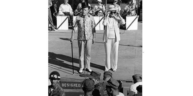 Bob Hope (left) entertaining the troops.