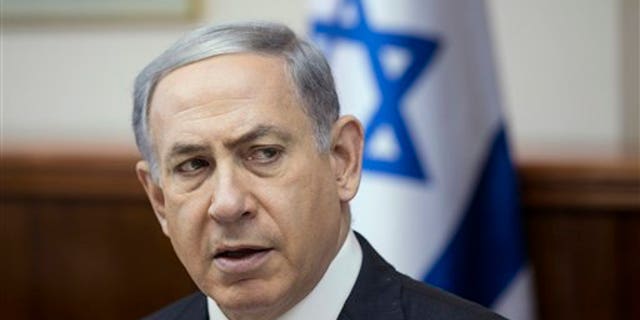 Israel's Prime Minister Benjamin Netanyahu speaks during the weekly cabinet meeting in Jerusalem, Sunday, July 5, 2015. (Baz Ratner/Pool Photo via AP)