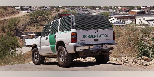 NOGALES, AZ - JUNE 01: A Border Patrol agent patrols the border June 1, 2010 in Nogales, Arizona. During the 2009 fiscal year 540,865 undocumented immigrants were apprehended entering the United States illegally along the Mexican border, 241,000 of those were captured along this 262 mile stretch of the border known as the Tucson Sector. (Photo by Scott Olson/Getty Images)