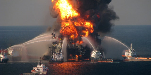 GULF OF MEXICO - APRIL 21: In this handout image provided be the U.S. Coast Guard, fire boat response crews battle the blazing remnants of the off shore oil rig Deepwater Horizon in the Gulf of Mexico on April 21, 2010 near New Orleans, Louisiana. An estimated leak of 1,000 barrels of oil a day are still leaking into the gulf. Multiple Coast Guard helicopters, planes and cutters responded to rescue the Deepwater Horizon's 126 person crew. (Photo by U.S. Coast Guard via Getty Images)