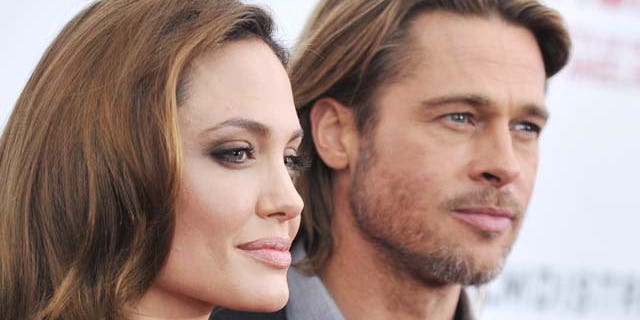 Dec. 5, 2011: Angelina Jolie and Brad Pitt attend the premiere of "In the Land of Blood and Honey" at the School of Visual Arts in New York City.