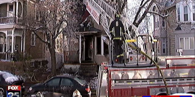 Jan. 22, 2012: This photo shows firefighters responding to a fire at an off-campus house of Boston University students.