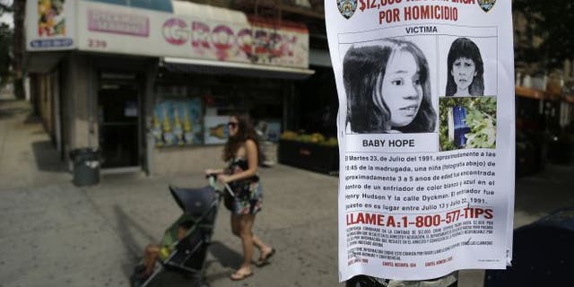 July 23, 2013: This photo shows a poster soliciting information regarding an unidentified body near the site where the body was found in New York. (AP)