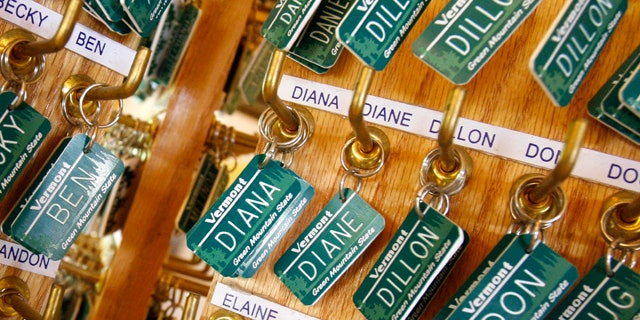 Luggage tags with children's names are displayed in East Montpelier, Vt.