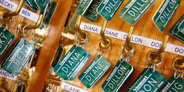 Luggage tags with children's names are displayed in East Montpelier, Vt.