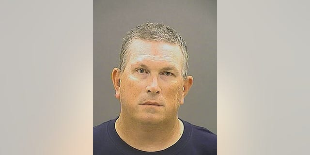 This photo provided by Baltimore Police shows Wesley Cagle. Cagle, a Baltimore police officer who authorities say shot a burglary suspect in the groin at close range after he'd been subdued is being charged with attempted first- and second-degree murder, the city's top prosecutor announced Wednesday, Aug. 19, 2015. (Baltimore Police via AP)