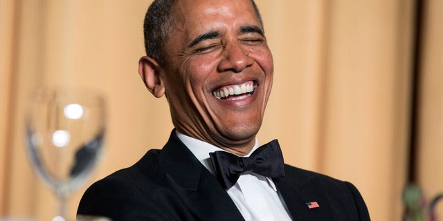 President Barack Obama laughs at a joke during the White House Correspondents' Association Dinner in Washington May 3, 2014. (REUTERS/Joshua Roberts)