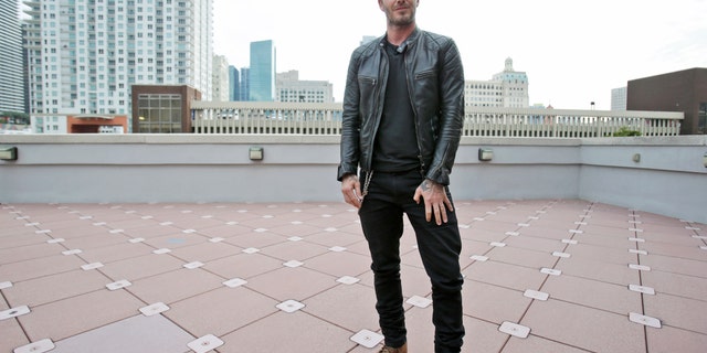 March 24, 2014: In this file photo, former England soccer star David Beckham speaks during a news conference in Miami.