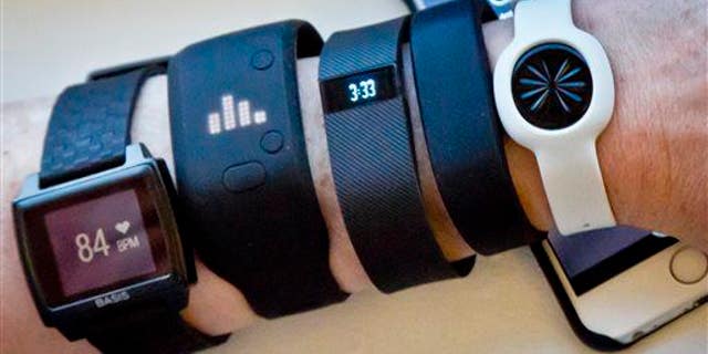 Fitness trackers are displayed in New York.