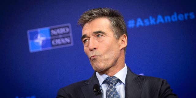 NATO Secretary General Anders Fogh Rasmussen pauses before speaking during a Carnegie Europe think tank event at the Bibliotheque Solvay in Brussels on Monday, Sept. 15, 2014. 