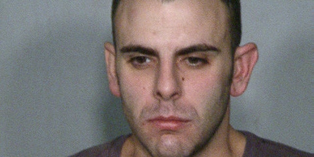 Police say 29-year-old Anthony Carleo, pictured above, was the motorcycle-helmeted robber who grabbed high-value casino chips from the Bellagio before making off on a motorcycle Dec. 14 (Las Vegas Police Department).