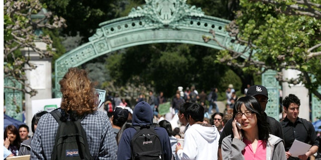 BERKELEY, CA - APRIL 17: UC Berkeley students walk through Sather Gate on the UC Berkeley campus April 17, 2007 in Berkeley, California. Robert Dynes, President of the University of California, said the University of California campuses across the state will reevaluate security and safety policies in the wake of the shooting massacre at Virginia Tech that left 33 people dead, including the gunman, 23 year-old student Cho Seung-Hui. (Photo by Justin Sullivan/Getty Images)