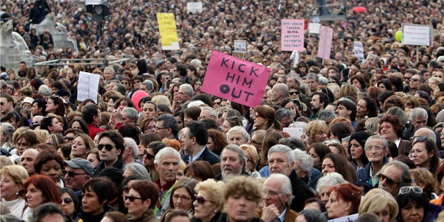 Feb. 13, 2011: People march against Italian premier Silvio Berlusconi during a protest in Rome. Thousands of women turned out in 200 Italian cities to denounce what they say is Berlusconi's debasing of females.