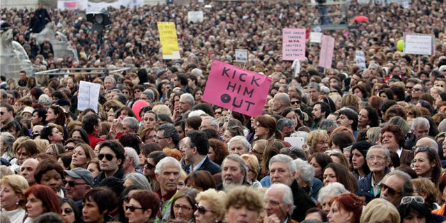 Feb. 13, 2011: People march against Italian premier Silvio Berlusconi during a protest in Rome. Thousands of women turned out in 200 Italian cities to denounce what they say is Berlusconi's debasing of females.