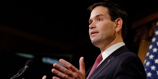 WASHINGTON, DC - DECEMBER 17:  Sen. Marco Rubio (R-FL) reacts to U.S. President Barack Obama's announcement about revising policies on U.S.-Cuba relations on December 17, 2014 in Washington, DC. Rubio called the President a bad negotiator and criticized what he claimed was a deal with no democratic advances for Cuba.  (Photo by T.J. Kirkpatrick/Getty Images)