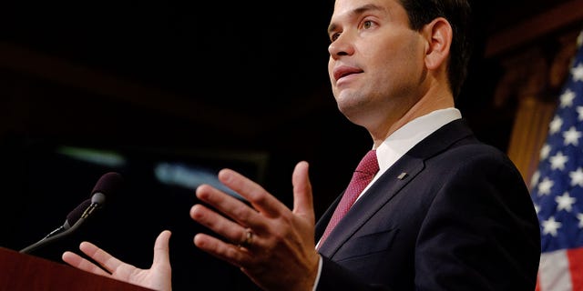 WASHINGTON, DC - DECEMBER 17: Sen. Marco Rubio (R-FL) reacts to U.S. President Barack Obama's announcement about revising policies on U.S.-Cuba relations on December 17, 2014 in Washington, DC. Rubio called the President a bad negotiator and criticized what he claimed was a deal with no democratic advances for Cuba. (Photo by T.J. Kirkpatrick/Getty Images)