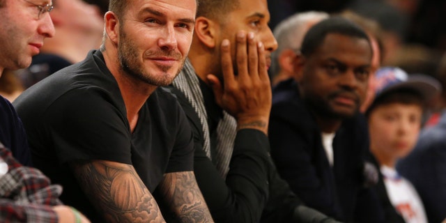 NEW YORK, NY - FEBRUARY 1: Former soccer player David Beckham watches the action during a game between the Miami Heat and the New York Knicks at Madison Square Garden on February. 1, 2014 in New York City. The Heat defeated the Knicks 106-91. NOTE TO USER: User expressly acknowledges and agrees that, by downloading and/or using this Photograph, user is consenting to the terms and conditions of the Getty Images License Agreement. (Photo by Rich Schultz /Getty Images)