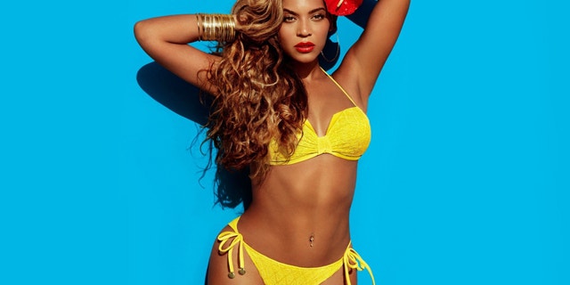 Beyonce poses in an ad for H&M.