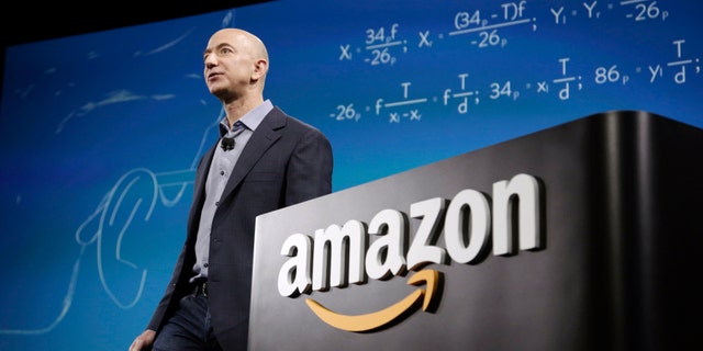 File photo - Amazon CEO Jeff Bezos discusses his company's new Fire smartphone at a news conference in Seattle, Washington June 18, 2014.