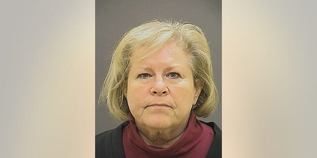 FILE - This undated file photo provided by the Baltimore Police Department shows former Episcopal Bishop Heather Cook. Cook pleaded guilty Tuesday, Sept. 8, 2015, to manslaughter, drunken driving and leaving the scene at which she killed a cyclist. Under an agreement with prosecutors, the state of Maryland will ask a Baltimore Circuit Court judge next month to sentence Cook to 10 years in prison. (Baltimore Police Department via AP, File)