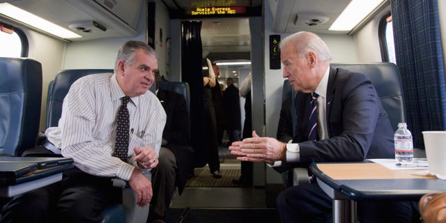 Feb. 8: Joe Biden, talks with Transportation Secretary Ray LaHood on a train heading to Philadelphia.