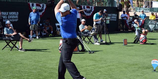 In this Sept. 27, 2014 photo provided by the Long Drivers of America, Connor Powers qualifies to become one of the Las Vegas 8 in Mesquite, Nev. Powers has a bit of Happy Gilmore in him as he winds up to attack a golf ball with his driver, though he doesn't shoot the kind of low scores Adam Sandler's character did in the movie. On Tuesday, Nov. 4, he could earn a cool $250,000 if he can be the biggest of the big hitters in the winner-take-all RE/MAX World Long Drive Championship. (AP Photo/Long Drivers of America)