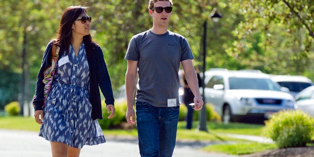 July 9, 2011: Mark Zuckerberg, president and CEO of Facebook, walks with Priscilla Chan during the 2011 Allen and Co. Sun Valley Conference, in Sun Valley, Idaho.