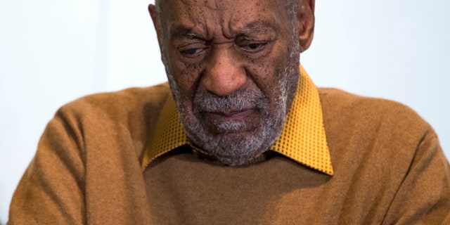 FILE - In this Nov. 6, 2014 file photo, entertainer Bill Cosby pauses during a news conference. (AP Photo/Evan Vucci, File)