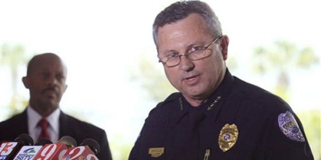 In this March 22, 2012 file photo, Sanford Police Chief Bill Lee speaks to the media during a news conference as city manager Norton Bonaparte Jr. listens at left, in Sanford, Fla.