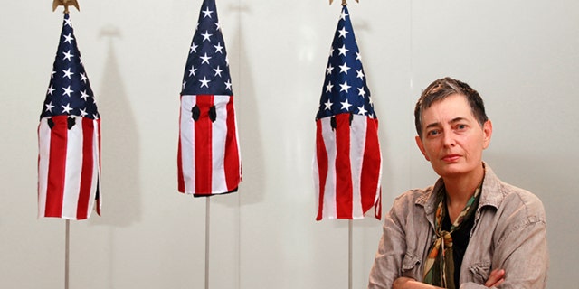 University of Miami professor Billie Lynn sparked outrage for her art exhibit displaying American flags as Ku Klux Klan hoods.