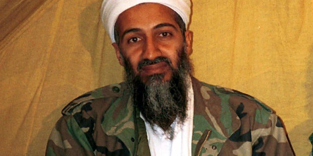 FILE - This undated file photo shows al Qaida leader Osama bin Laden in Afghanistan. A federal appeals court is backing the U.S. government's decision not to release photos and video taken of Osama bin Laden during and after a raid in which the terrorist leader was killed by U.S. commandos. The three-judge panel of the U.S. Circuit Court of Appeals for the District of Columbia turned down an appeal Tuesday from Judicial Watch, a conservative watchdog group, which had filed a Freedom of Information Act request for the images. (AP Photo, File)