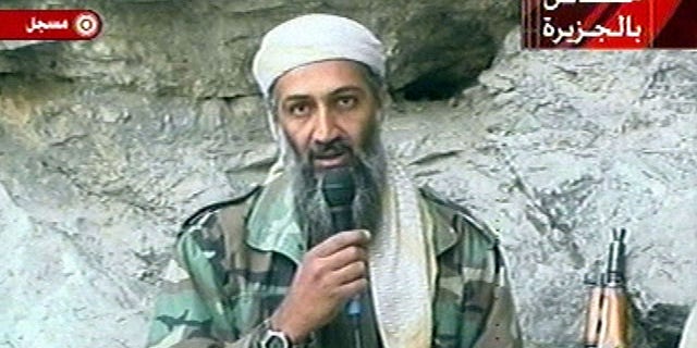 Oct. 7: This image, made from a video broadcast, shows Usama bin Laden at an undisclosed location. The Al Qaeda leader threatened to kill French citizens in a new audio tape posted Oct. 27 to avenge their country's support for the U.S.-led war in Afghanistan.