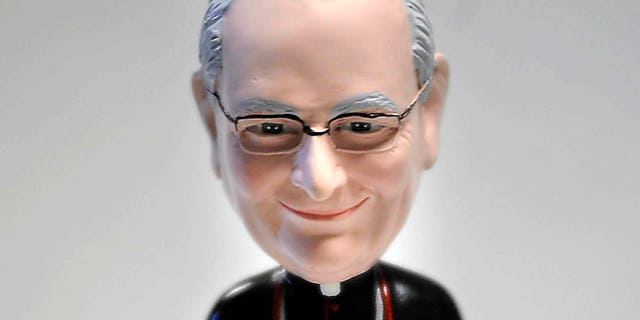 July 26: Donald Trautman, the Roman Catholic Bishop in Erie, Pennsylvania, received a special gift in honor of his 75th birthday: a bobblehead in his likeness.