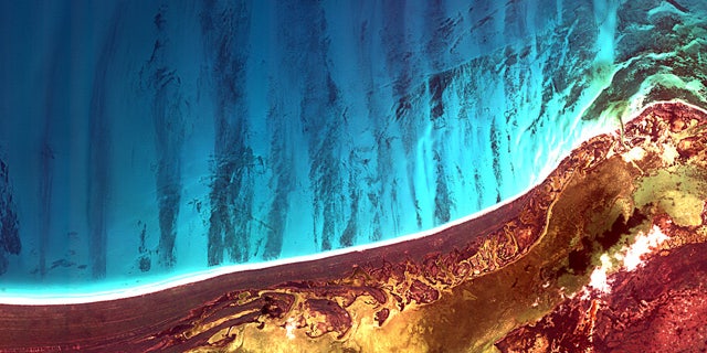 Holbox Island and the Yalahau Lagoon on the northeast corner of Mexicos Yucatan Peninsula are featured in this image, acquired by the Korea Multi-purpose Satellite (Kompsat-2) of the Korea Aerospace Research Institute (KARI).
