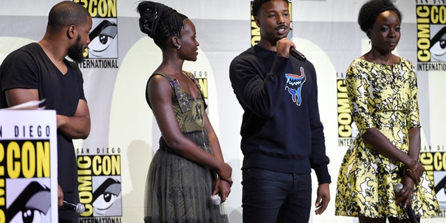 FILE - In this July 23, 2016 file photo, director Ryan Coogler, from left, Lupita Nyong'o, Michael B. Jordan and Danai Gurira attend the "Black Panther" panel on day 3 of Comic-Con International in San Diego. The movie set to begin filming in January will mark the third time director Ryan Coogler has worked with actor Michael B. Jordan. They teamed up previously on "Creed" and "Fruitvale Station." (Photo by Chris Pizzello/Invision/AP, File)