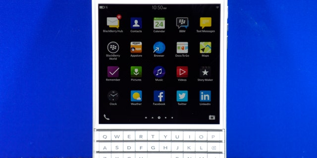 A BlackBerry Passport smartphone is shown at its official launching event in Toronto, Sep. 24.