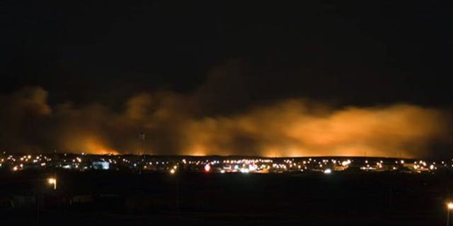 Jan.4: Smoke and fire rise over Browning, Mt.