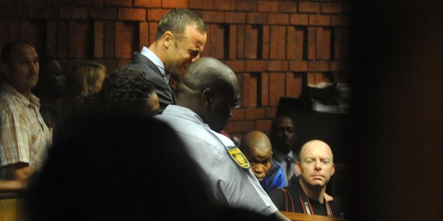 Feb. 15, 2013: South African athlete Oscar Pistorius reacts,  in court in Pretoria, South Africa at his bail hearing in the murder case of his girlfriend Reeva Steenkamp.