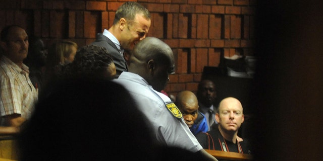 Feb. 15, 2013: South African athlete Oscar Pistorius reacts, in court in Pretoria, South Africa at his bail hearing in the murder case of his girlfriend Reeva Steenkamp.