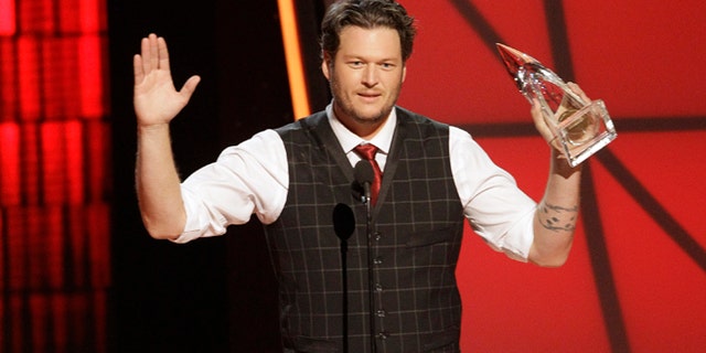 Nov. 1, 2012: Blake Shelton accepts the award for entertainer of the year at the 46th Annual Country Music Awards at the Bridgestone Arena in Nashville, Tenn.